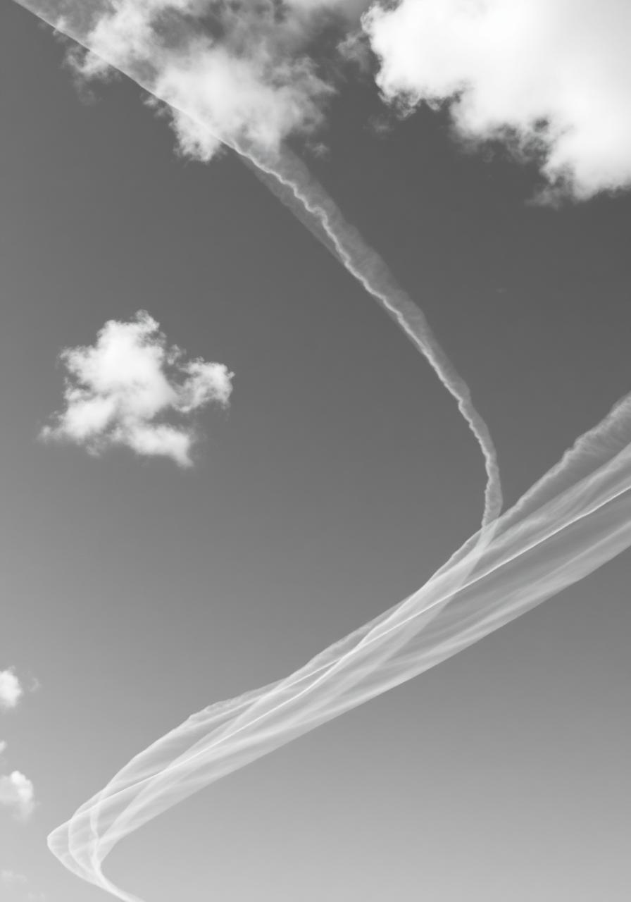 Vapor trails crossing the sky